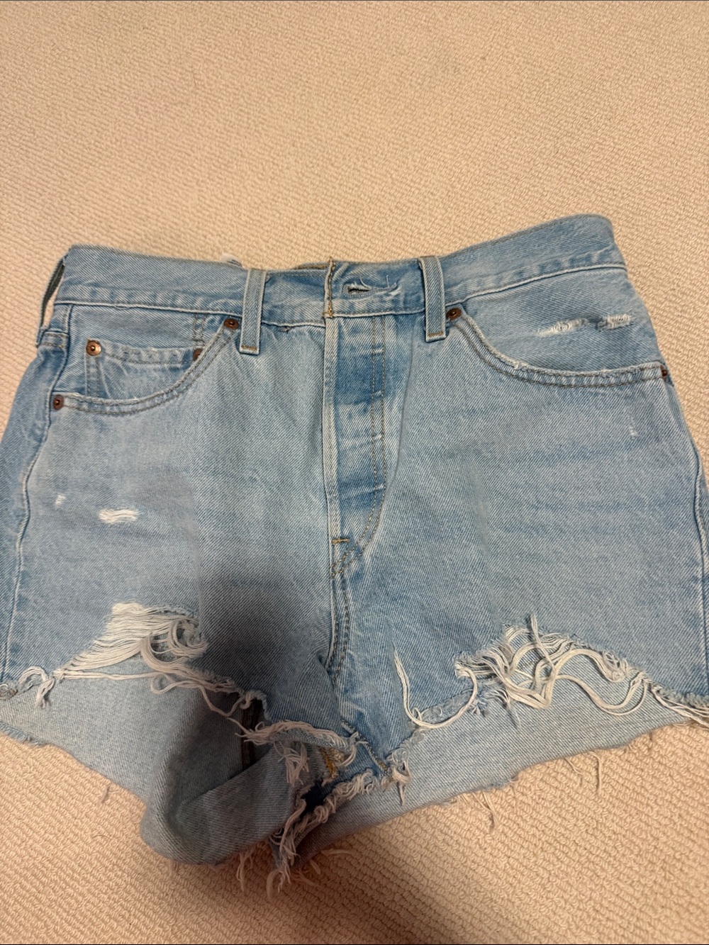 Levi's light blue distressed jean shorts